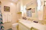 The full bath has a step-in shower.
